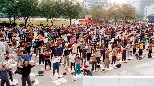Morning Falun Gong exercises in Beijing park, 1998.